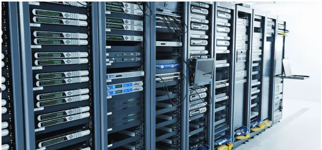Rows of server racks inside a modern data center